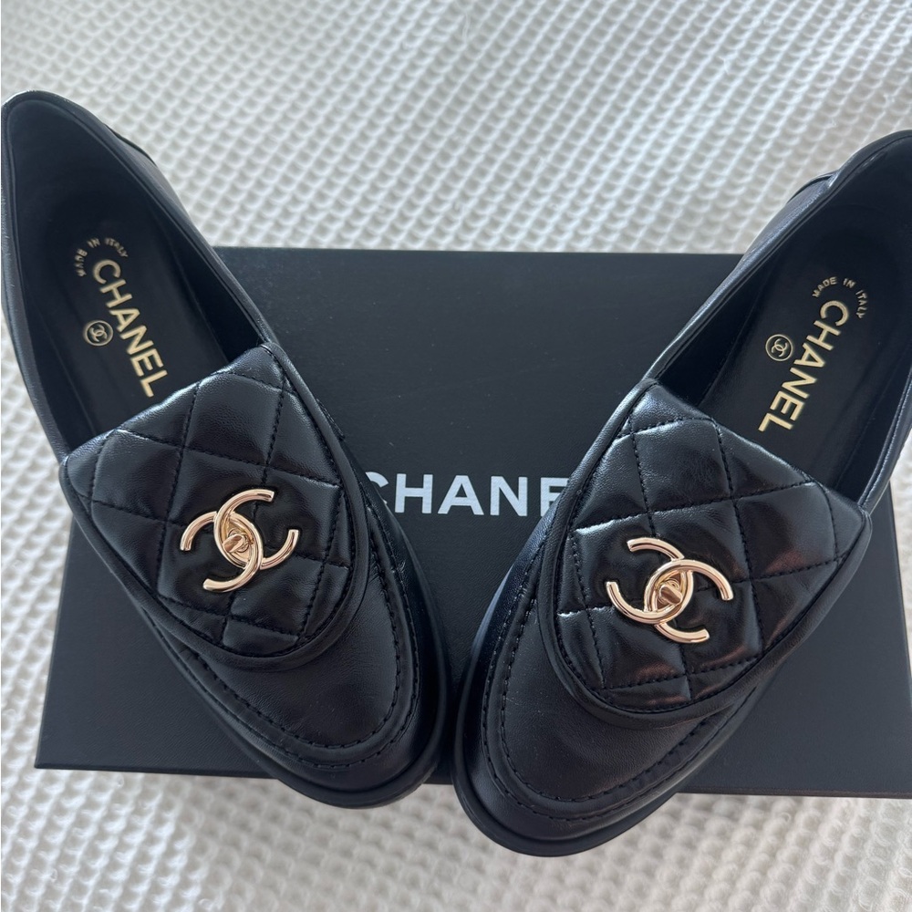 Coco Chanel black leather moccasins